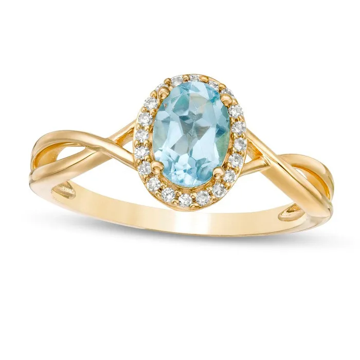 Goldia Rings Oval Swiss Blue Topaz and 007 CT TW Natural Diamond Frame Twist Shank Ring in Solid 10K Yellow Gold