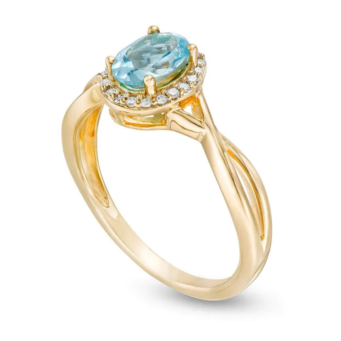 Goldia Rings Oval Swiss Blue Topaz and 007 CT TW Natural Diamond Frame Twist Shank Ring in Solid 10K Yellow Gold Goldia Rings Oval Swiss Blue Topaz and 007 CT TW Natural Diamond Frame Twist Shank Ring in Solid 10K Yellow Gold