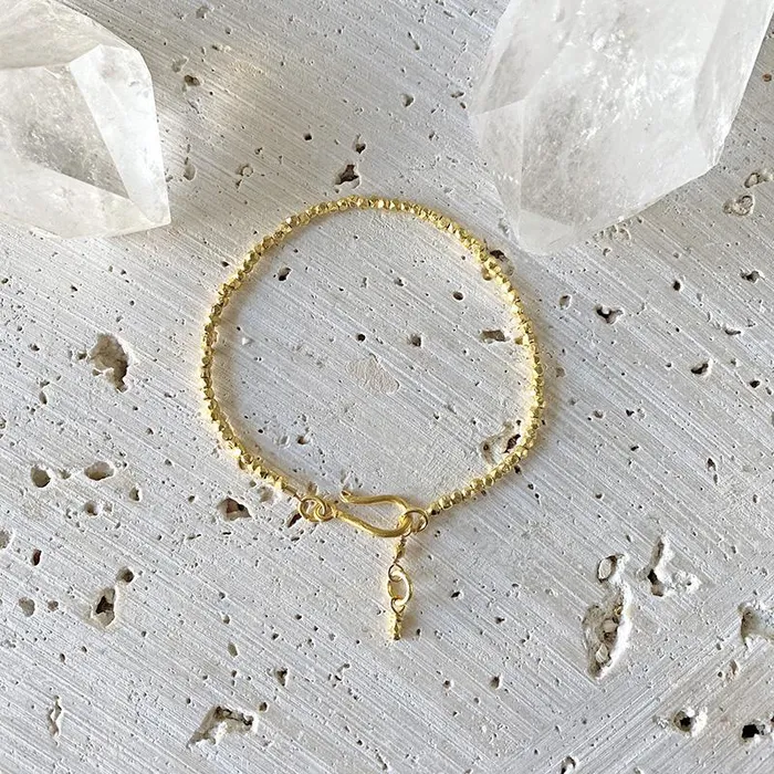 Robindira Unsworth Shimmering Gold Bracelet Bracelets